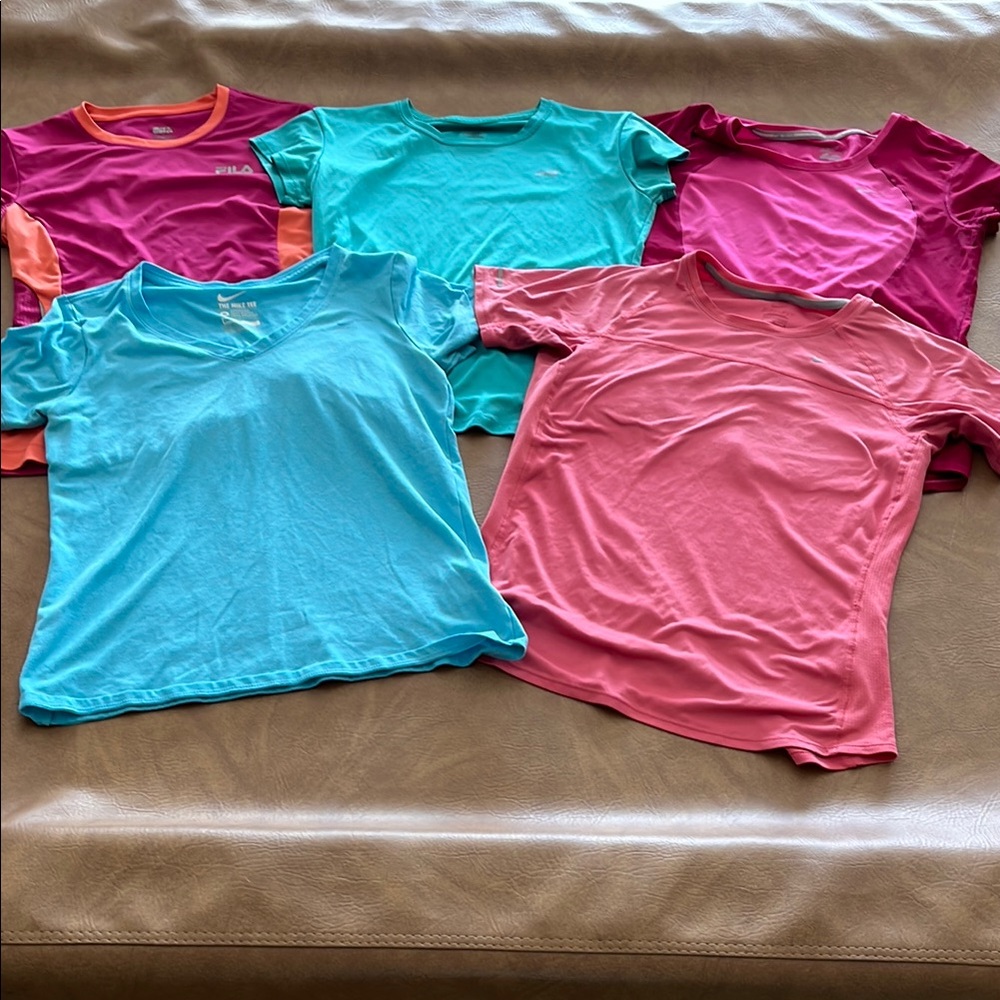 Colorful Women’s athletic style shirts. Size Medium.  Brands: Nike, Fila, & Avía